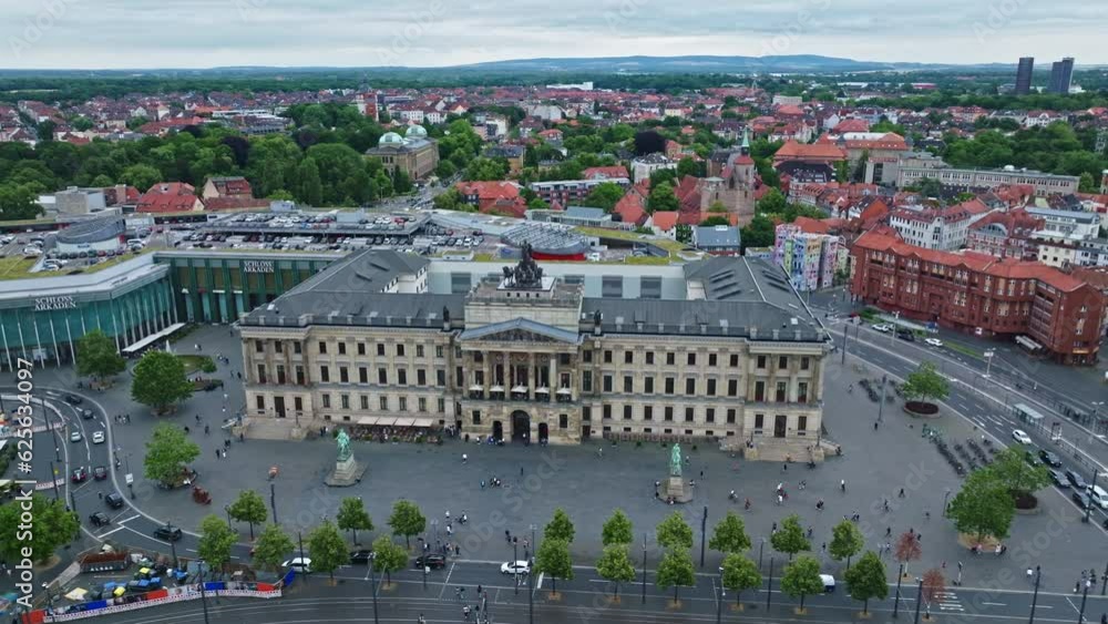 Aerial Drone shot of Schloss-Arkaden Braunschweig . Brunswick Palace or Residenzschloss . Spacious , contemporary mall inside an old castle facade with diverse shops, dining and ample parking . Aerial Drone shot of Schloss-Arkaden Braunschweig . Brunswick Palace or Residenzschloss . Spacious , contemporary mall inside an old castle facade with diverse shops, dining and ample parking .