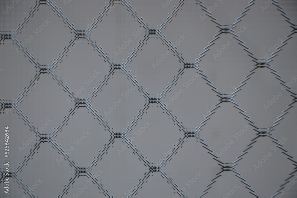 Fototapeta premium The abstract pattern background resembles a glass prism.