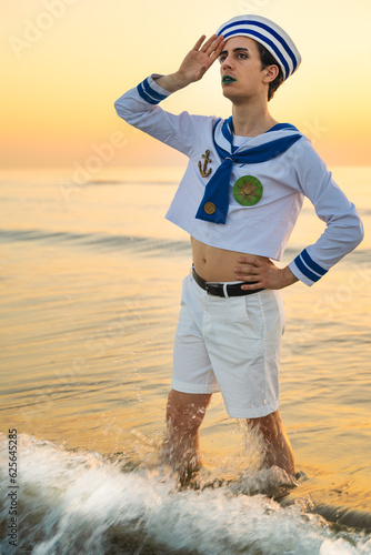 Italian man cosplay Gappy from the anime jojo. Man dressed as a sailor. Blue uniform, amazement. photo