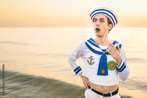 Italian man cosplay Gappy from the anime jojo. Man dressed as a sailor. Blue uniform, amazement. photo