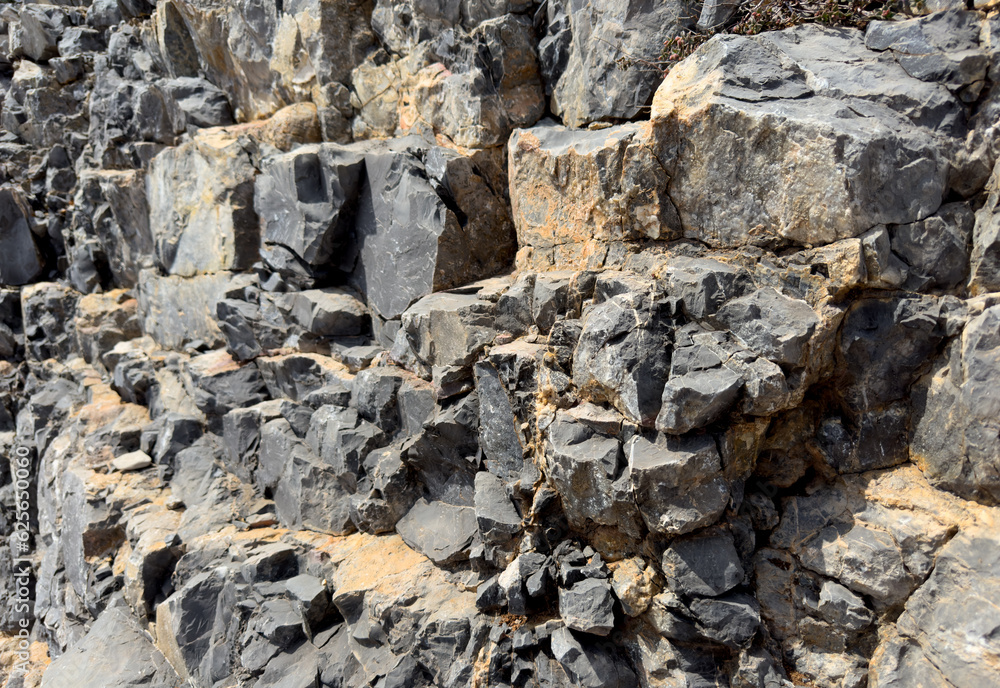 Granite Stone background, rock texture. Wall stone Granite background. Rock with cracks and layers. Rough rocky texture of mountains. Mining and geology. Texture of marble wall. Granite Stone background, rock texture. Wall stone Granite background. Rock with cracks and layers. Rough rocky texture of mountains. Mining and geology. Texture of marble wall.