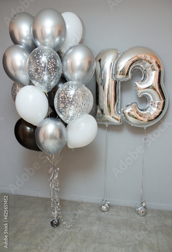 set of silver balloons with silver numbers 13