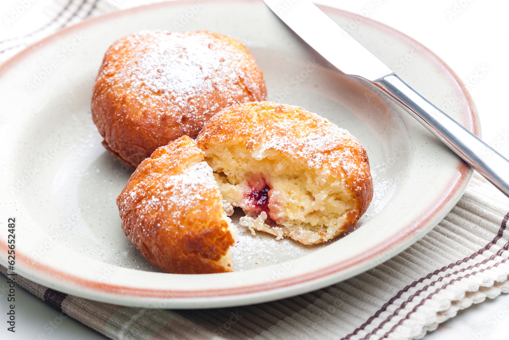 homemade donut filled with marmalade homemade donut filled with marmalade
