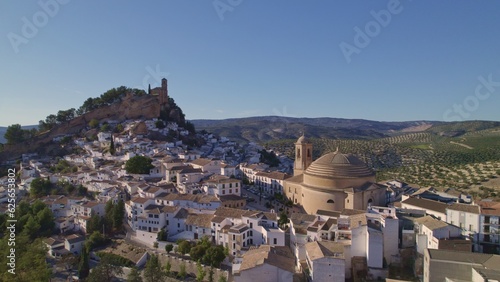 Montefrio. Panoramic aerial view of dome, white village and church on the cliff. One of the most beautiful views in the world according to National Geographic. Grenade. Spain.