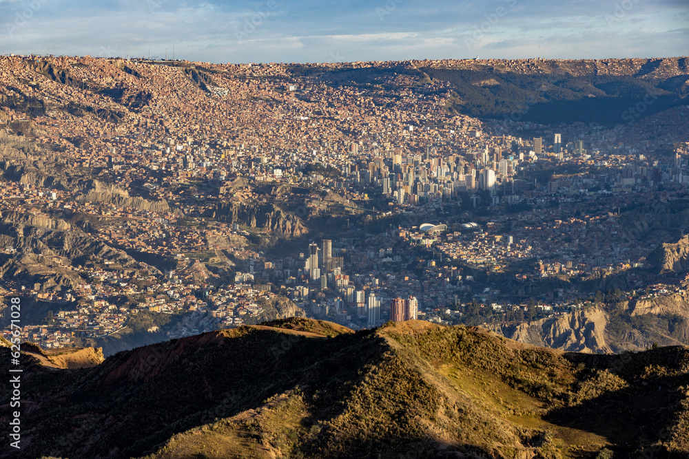 View from the landmark Muela del Diablo over the highest administrative capital, the vibrant city La Paz in Bolivia - traveling and exploring South America