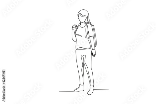 A female tourist carrying a duffel bag. World tourism day one-line drawing