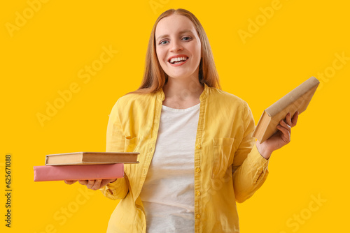 Young woman with books on y...