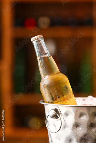 Chilled beer bottle with co...