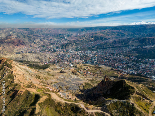 Aerial view from the impressive landmark Muela del Diablo down into the valley with the highest capital and vibrant city La Paz and El Alto, Bolivia © freedom_wanted