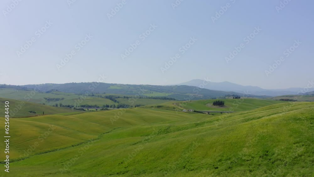Green rolling fields in spring Tuscany Italy Aerial view Green rolling fields in spring Tuscany Italy Aerial view