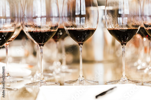 Close up wine glasses of red wine without hands 