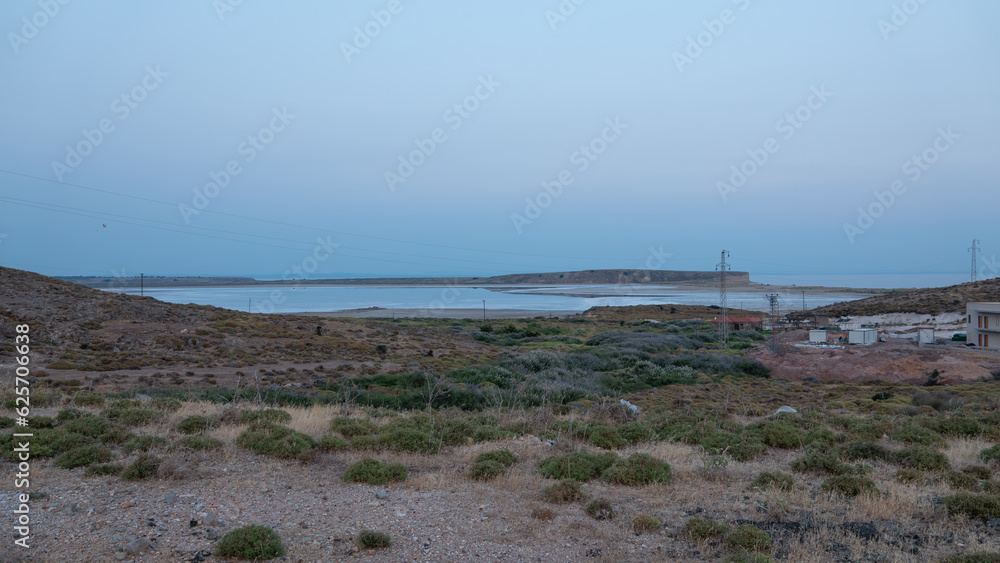 Salt Lake, located in the middle of Aydıncık and Kefaloz beaches. The black mud coming out of the lake is rubbed on the body by tourists considering it is good for some diseases. Salt Lake, located in the middle of Aydıncık and Kefaloz beaches. The black mud coming out of the lake is rubbed on the body by tourists considering it is good for some diseases.