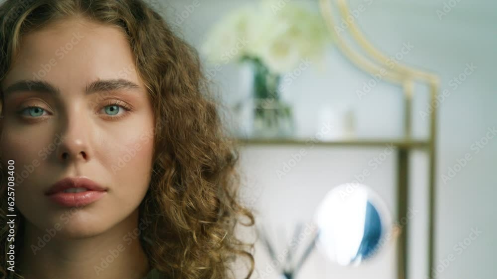 Beauty copy background. Portrait of young green eyed woman looking up with serious confident face expression in modern bright apartment with day light. Slow motion real people 4K footage RED camera Beauty copy background. Portrait of young green eyed woman looking up with serious confident face expression in modern bright apartment with day light. Slow motion real people 4K footage RED camera