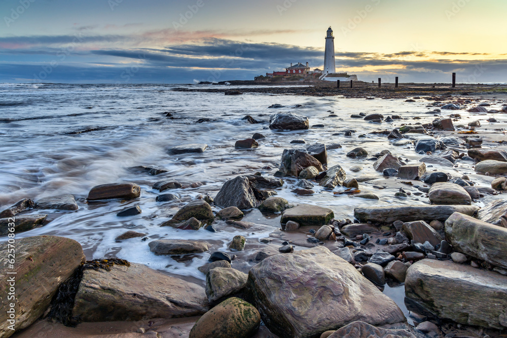 Sunrise at St. Mary's Lighthouse at Whitley Bay, North Tyneside, England.	