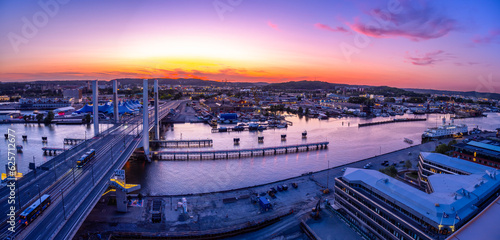 Gothenburg, Sweden - May 30, 2023: Sunset in the illuminated industrial Scandinavian city of Gothenburg, Sweden - high angle panorama view. photo
