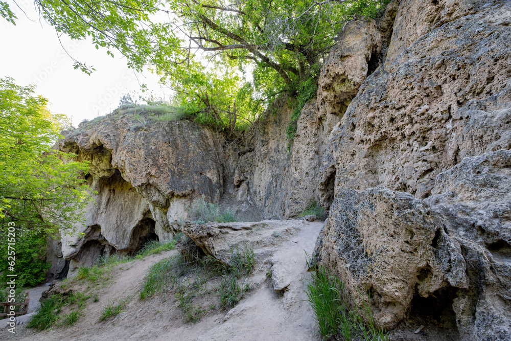 Sunny view of the cave landscape of the Rifle Falls