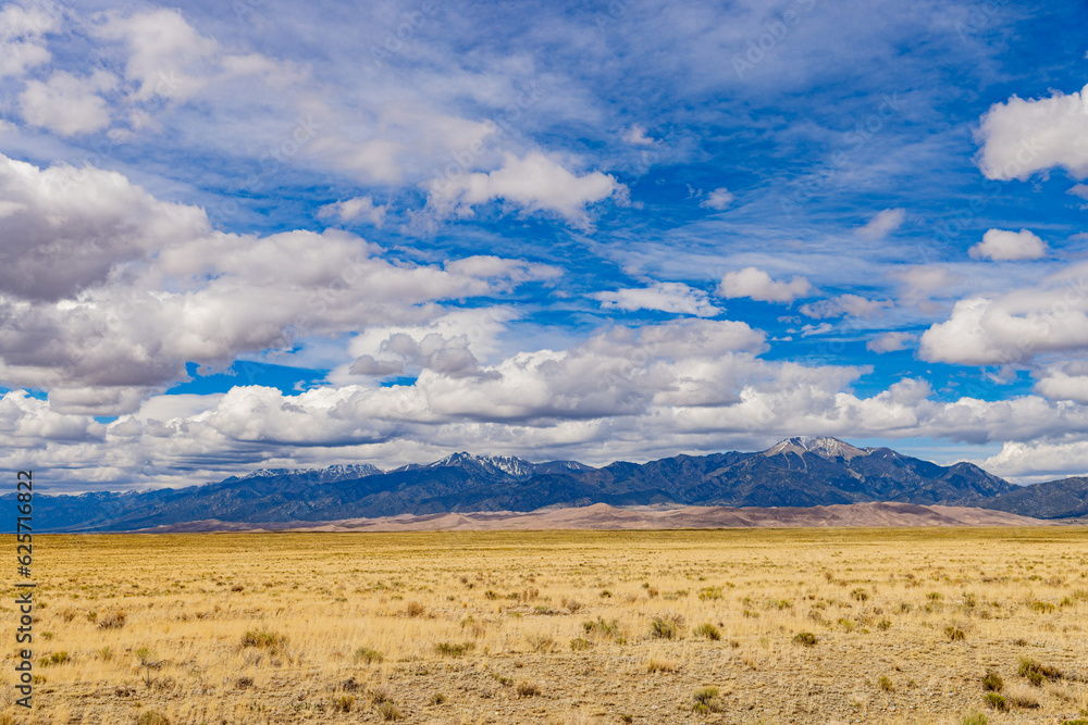 Sunny view of the landscape of Great Sand Dunes National Park and Preserve Sunny view of the landscape of Great Sand Dunes National Park and Preserve