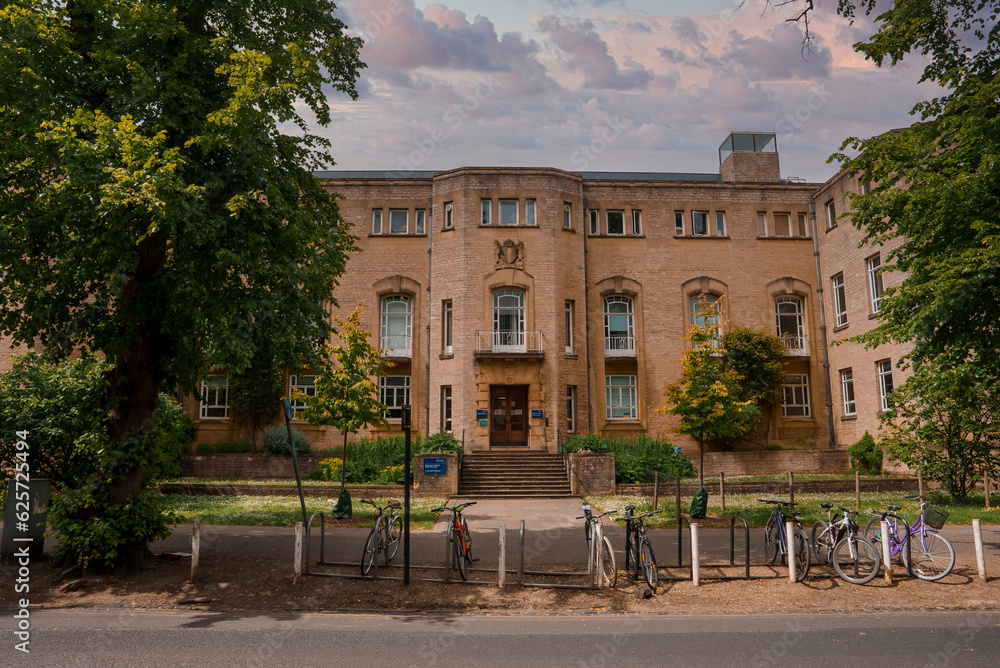 Fototapeta premium Exterior facade of department of plant sciences, with bicycles parked on street at University Of Oxford, England, UK