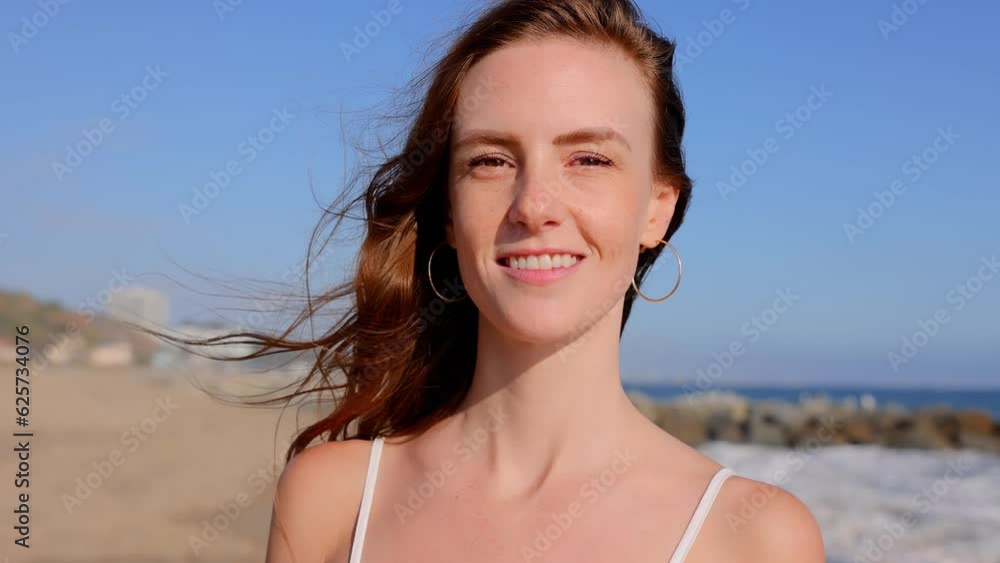 Portrait of an attractive woman at the beach at sunset. Slow Motion. Portrait of an attractive woman at the beach at sunset. Slow Motion.