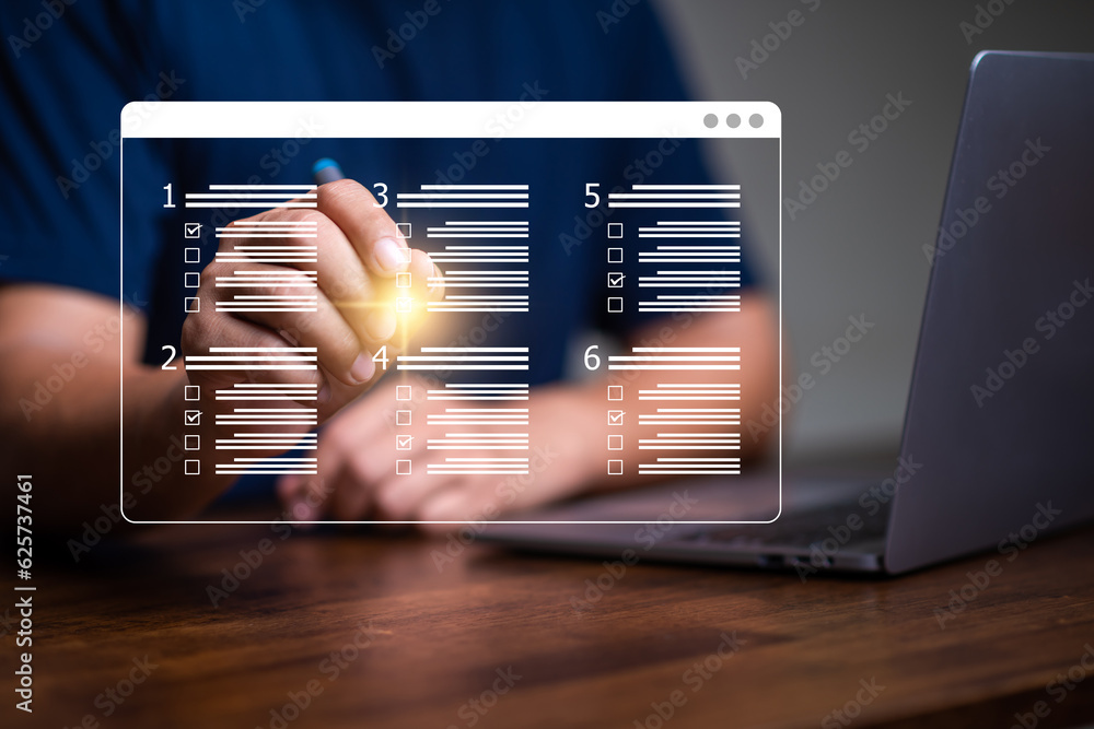 online exam and survey, man using laptop to Choosing the right answer ...