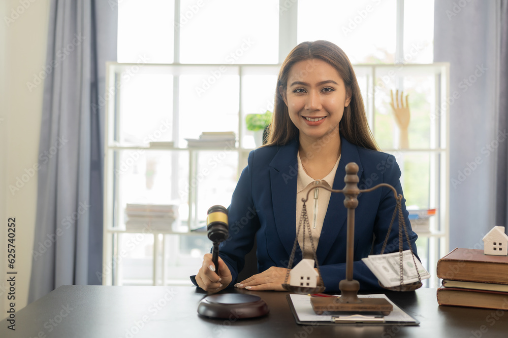 © MrAshi - A young Asian female lawyer who works with contracts on laptops in justice law firms and courtroom legal concepts on wooden tables and counsel or legal counsel, justice advice and concepts. © MrAshi - A young Asian female lawyer who works with contracts on laptops in justice law firms and courtroom legal concepts on wooden tables and counsel or legal counsel, justice advice and concepts.