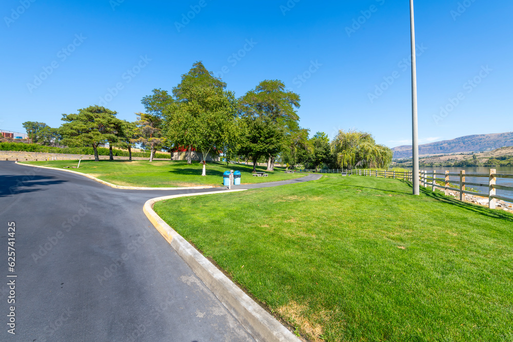 The scenic waterfront Kirby Billingsley Hydro Park along the Columbia River as it runs through East Wenatchee on Highway 28 in Chelan County, Washington State, USA.