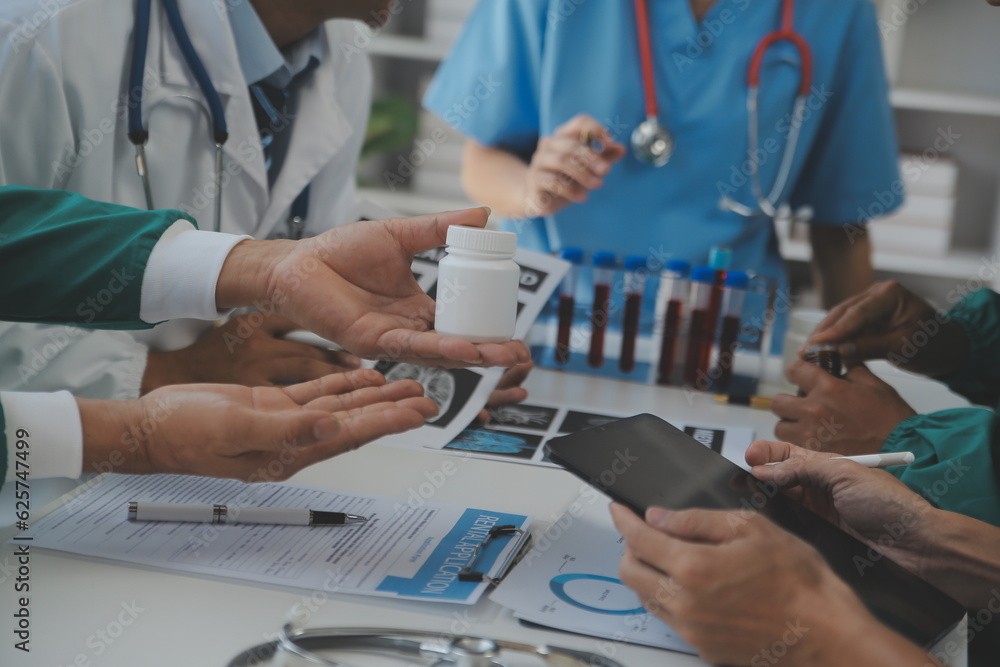 Cropped image of successful medical doctors discussing diagnosis during the conference Cropped image of successful medical doctors discussing diagnosis during the conference