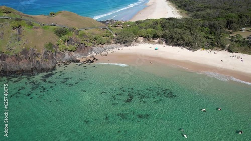 A Closer Aerial View of Norries Headland with Tourists Enjoying the Ocean in Cabarita Beach, Tweed Shire, Bogangar, Northern Rivers, New South Wales, Australia photo