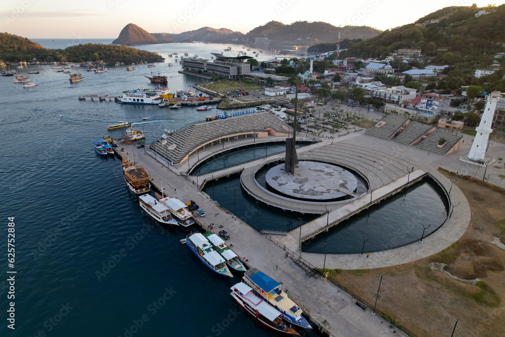 Labuan Bajo port - Rush Hour view in Labuan Bajo Harbour in the morning with Luxury Phinisi view Sailing Komodo National Park 