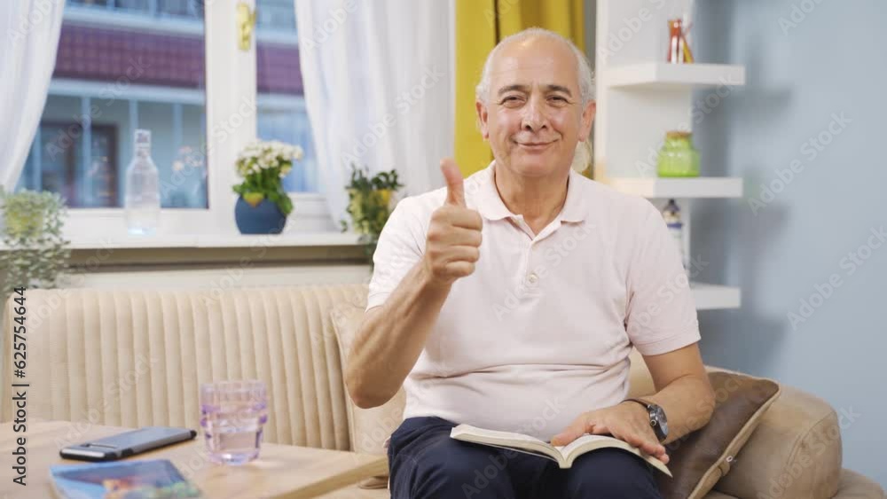 Od man giving congratulatory message to camera applauding. Od man giving congratulatory message to camera applauding.