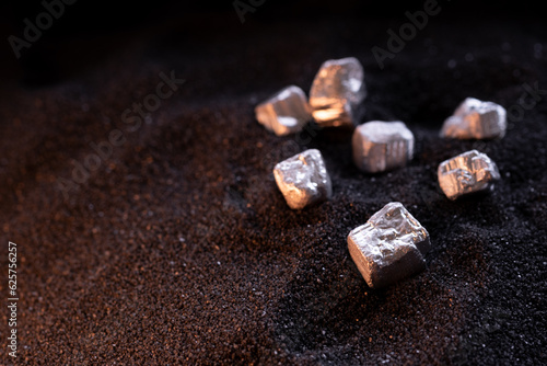Pure silver or platinum or rare earth from the mine that was placed on the black sand
