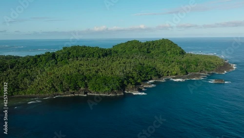 Drone survey of Beautiful Tropical Island with green trees. Surigao del Sur. Mindanao, Philippines. photo