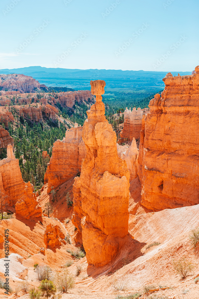Nature scene showing beautiful hoodoos, pinnacles and spires rock formations including famous Thors Hammer in Utah, United States.