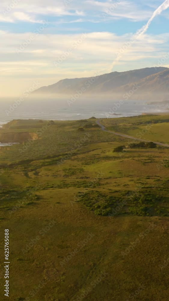 Cliff on the sea. Rocky coastline on the island. Drone Over Coastline Cliffs And Sea. California coast line. Aerial vertical background, vertical video background, vertical video. Cliff on the sea. Rocky coastline on the island. Drone Over Coastline Cliffs And Sea. California coast line. Aerial vertical background, vertical video background, vertical video.