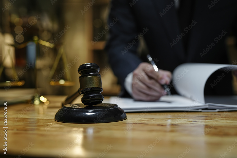 Judge gavel with Justice lawyers having team Concepts of Law and Legal services Judge gavel with Justice lawyers having team Concepts of Law and Legal services