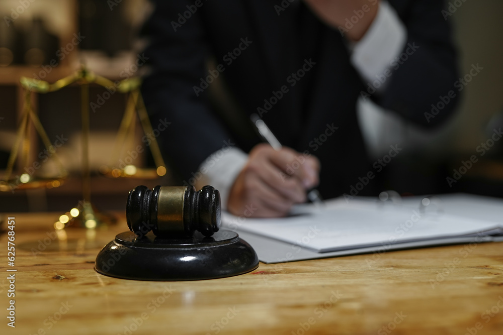 Judge gavel with Justice lawyers having team Concepts of Law and Legal services Judge gavel with Justice lawyers having team Concepts of Law and Legal services