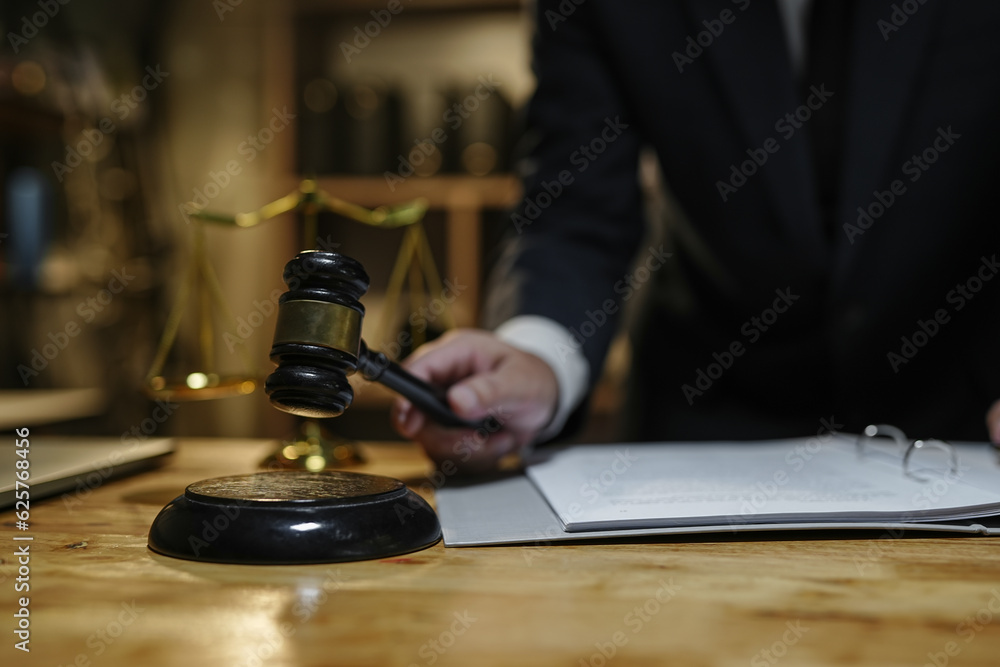 Judge gavel with Justice lawyers having team Concepts of Law and Legal services Judge gavel with Justice lawyers having team Concepts of Law and Legal services