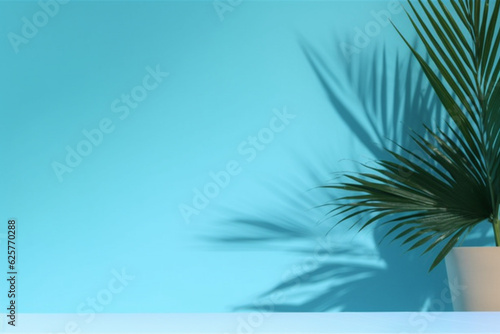 Blurred shadow from palm leaves on the blue wall  Minimal abstract background for product presentation  Spring and summer