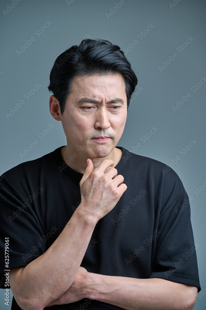 Middle-aged male office worker in casual clothes, various expressions of emotions Middle-aged male office worker in casual clothes, various expressions of emotions