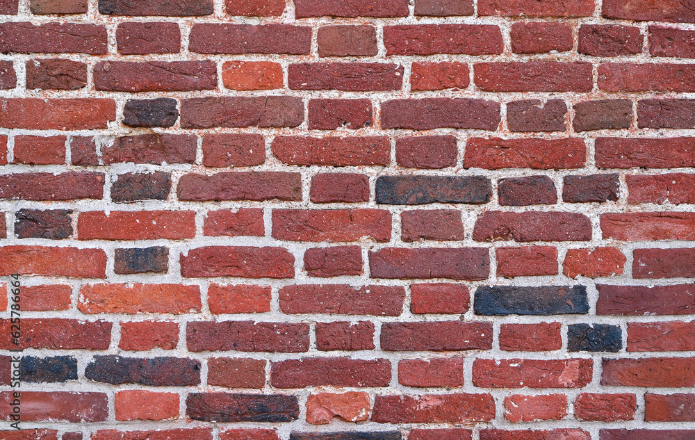 Obraz premium Texture of an old and damaged red brick wall as an architectural background