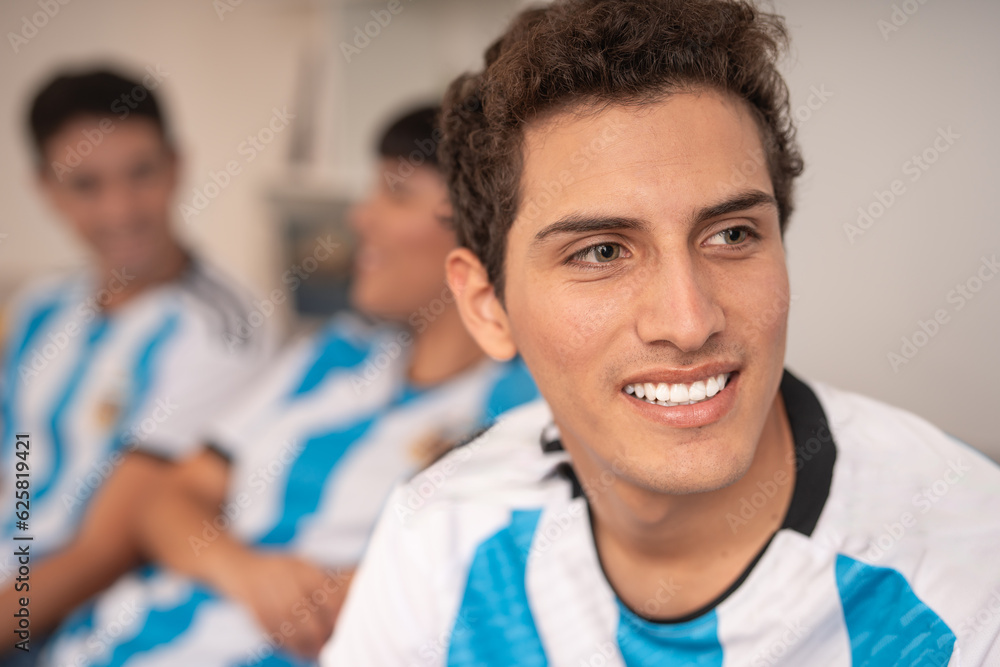 Man wearing the Argentina national soccer team jersey