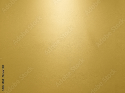 Gold Wall with Light from the Top Background.