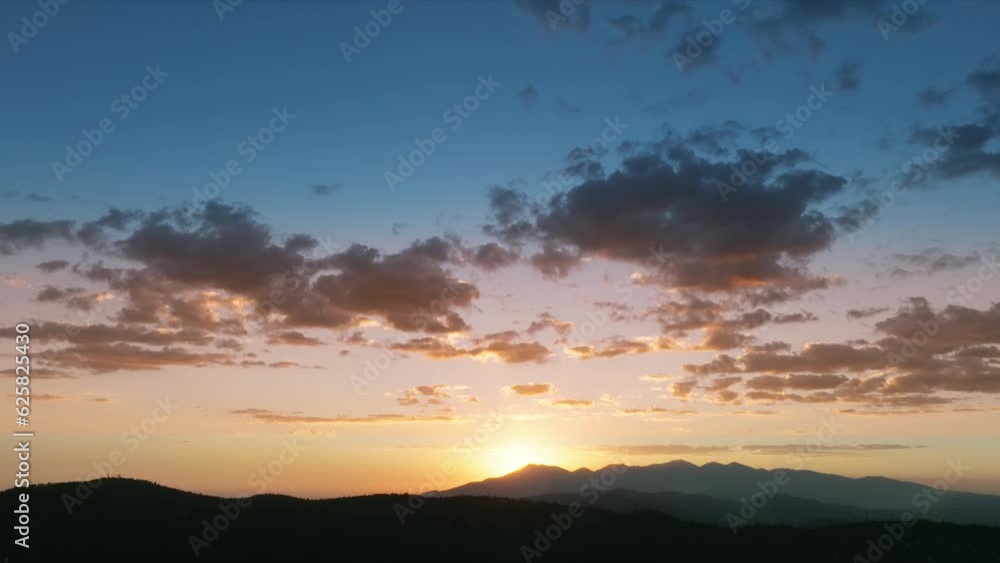 Clouds moving slowly on sky at sunset, Lake Arrowhead in the San Bernardino Mountains, Los Angeles, California, USA. Scenic view of colorful cloud formations flowing over the mountains, 4k footage Clouds moving slowly on sky at sunset, Lake Arrowhead in the San Bernardino Mountains, Los Angeles, California, USA. Scenic view of colorful cloud formations flowing over the mountains, 4k footage
