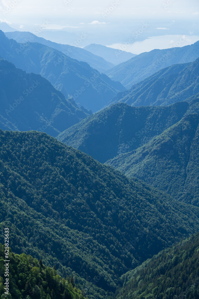 Green layers of mountains in Val Grande, the largest National Park and wilderness area in Italy.