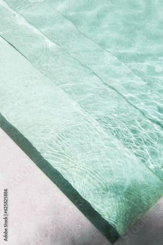 Modern Geometric Swimming Pool with Water Ripples and Waves