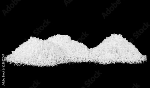 Pile of white fluffy snow isolated on a black background. Christmas night.