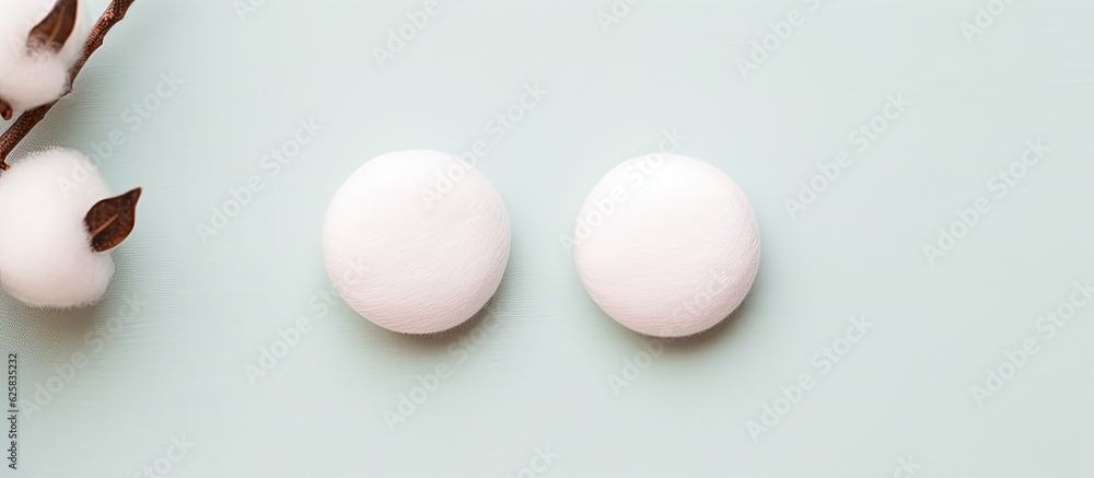 Photo of three white eggs on a table with plenty of copy space with copy space