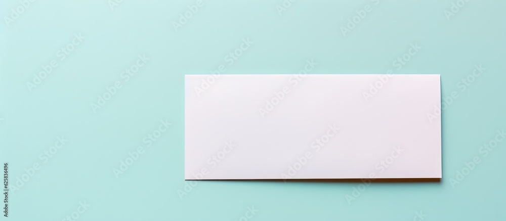 Photo of a blank white paper against a vibrant blue background, providing ample copy space for text or design elements with copy space Photo of a blank white paper against a vibrant blue background, providing ample copy space for text or design elements with copy space