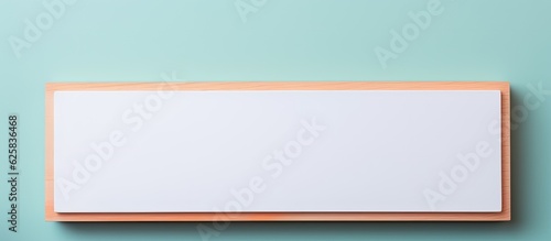 Photo of a blank white board mounted on a wall with copy space with copy space