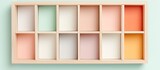 Photo of a vibrant and organized multicolored shelf with various compartments with copy space